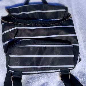 A new day black striped mini backpack